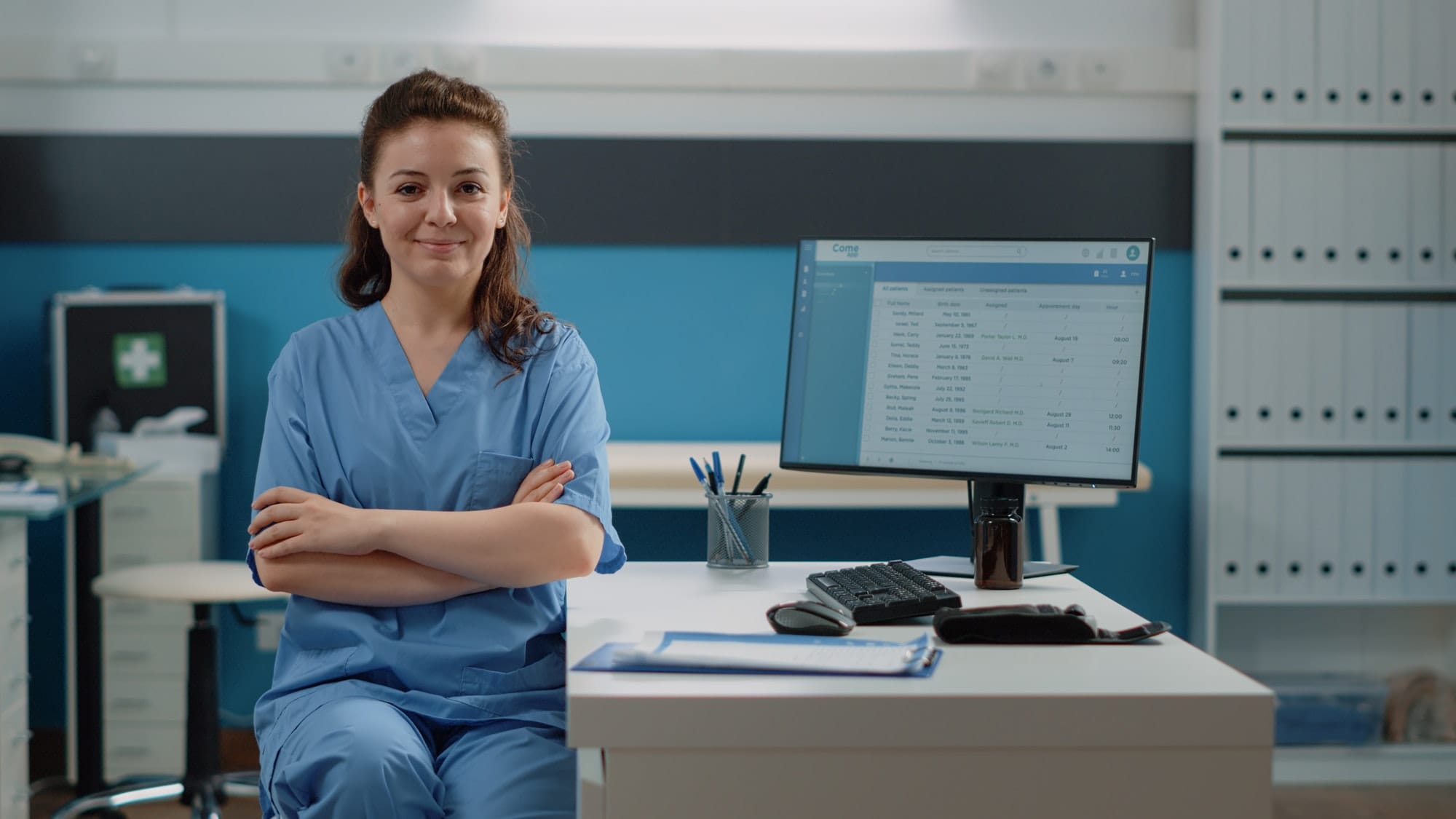 Portrait of woman working as medical assistant at desk