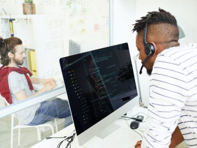 IT support operator answering question using headset