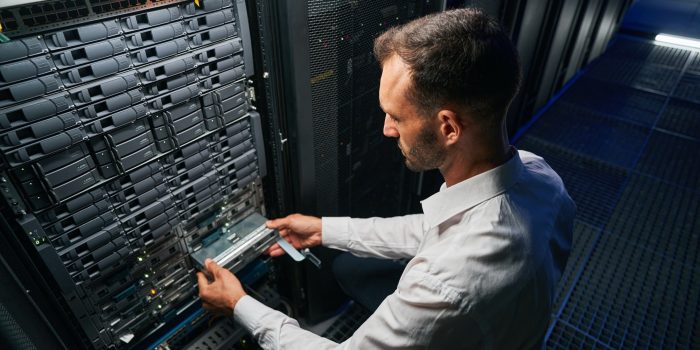 Professional it specialist working in data center